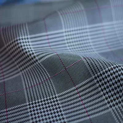Veste artificielle de vêtement de textile de tissu de polyester de cuir d'unité centrale de pied-de-poule de rayure
